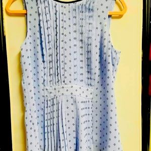 Elle sleeveless top.